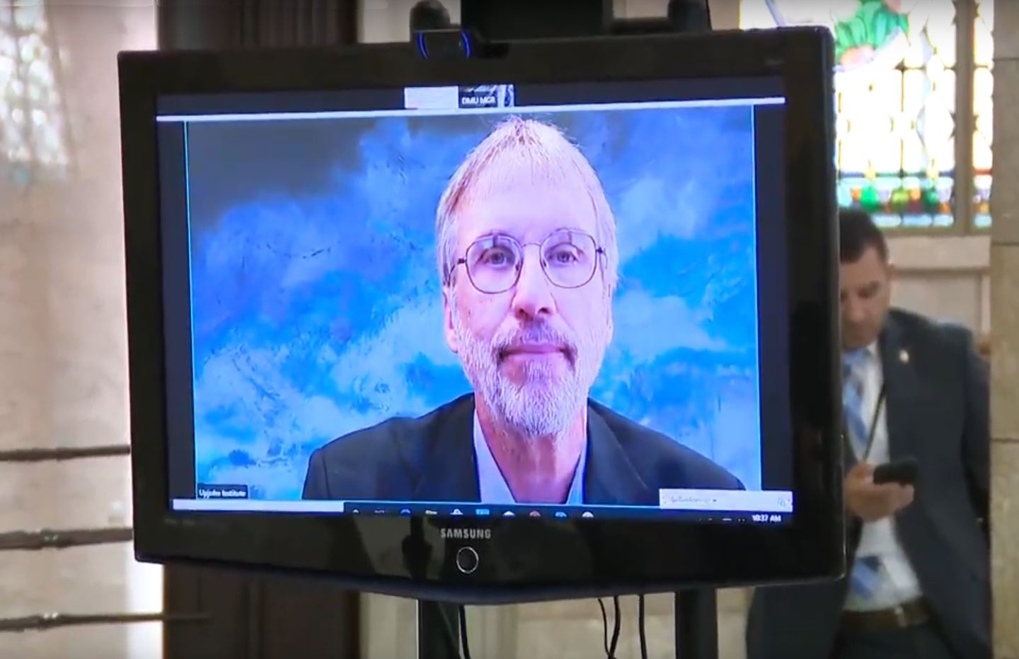 Image of Tim Bartik on a television screen in New Jersey