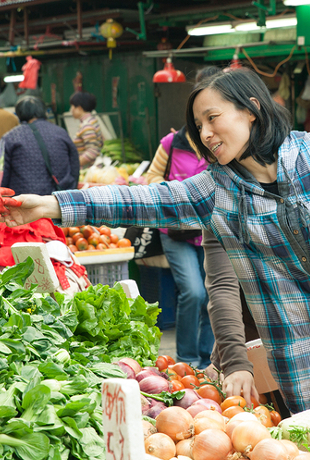 Woman picking fruit image