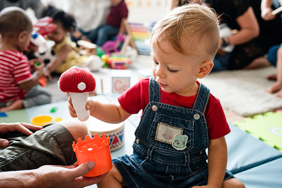 Boy plays at daycare center