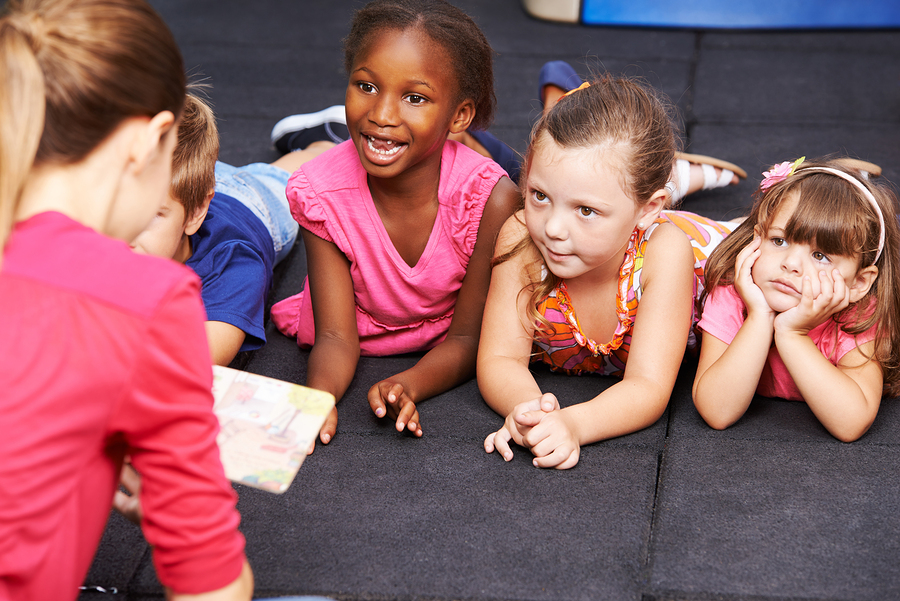 Preschool children listening to their teacher