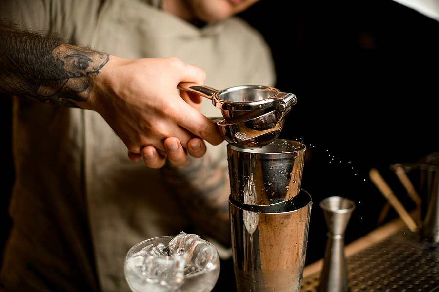 Bartender squeezes juice