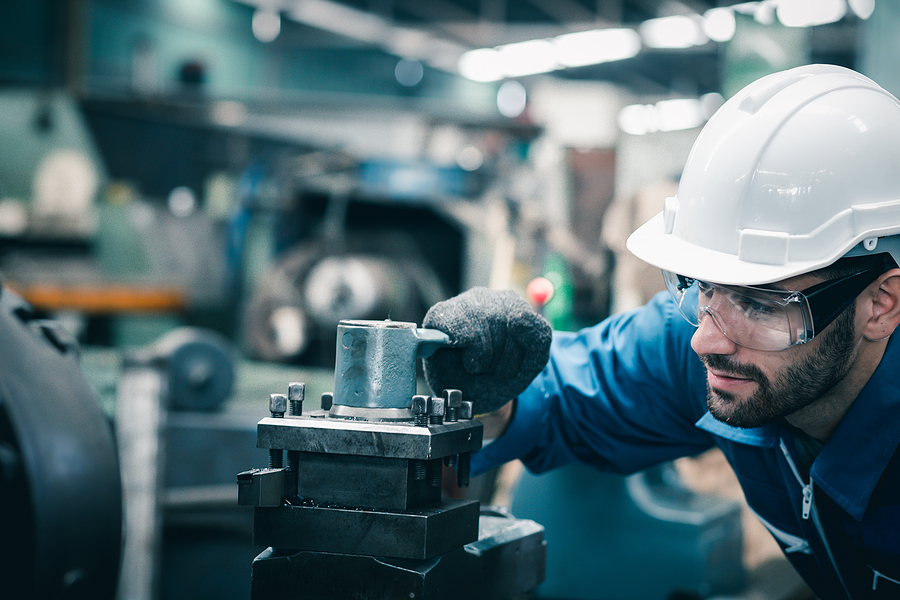 Cover image inset, Regional Economic Trends. Stock photo of male working.