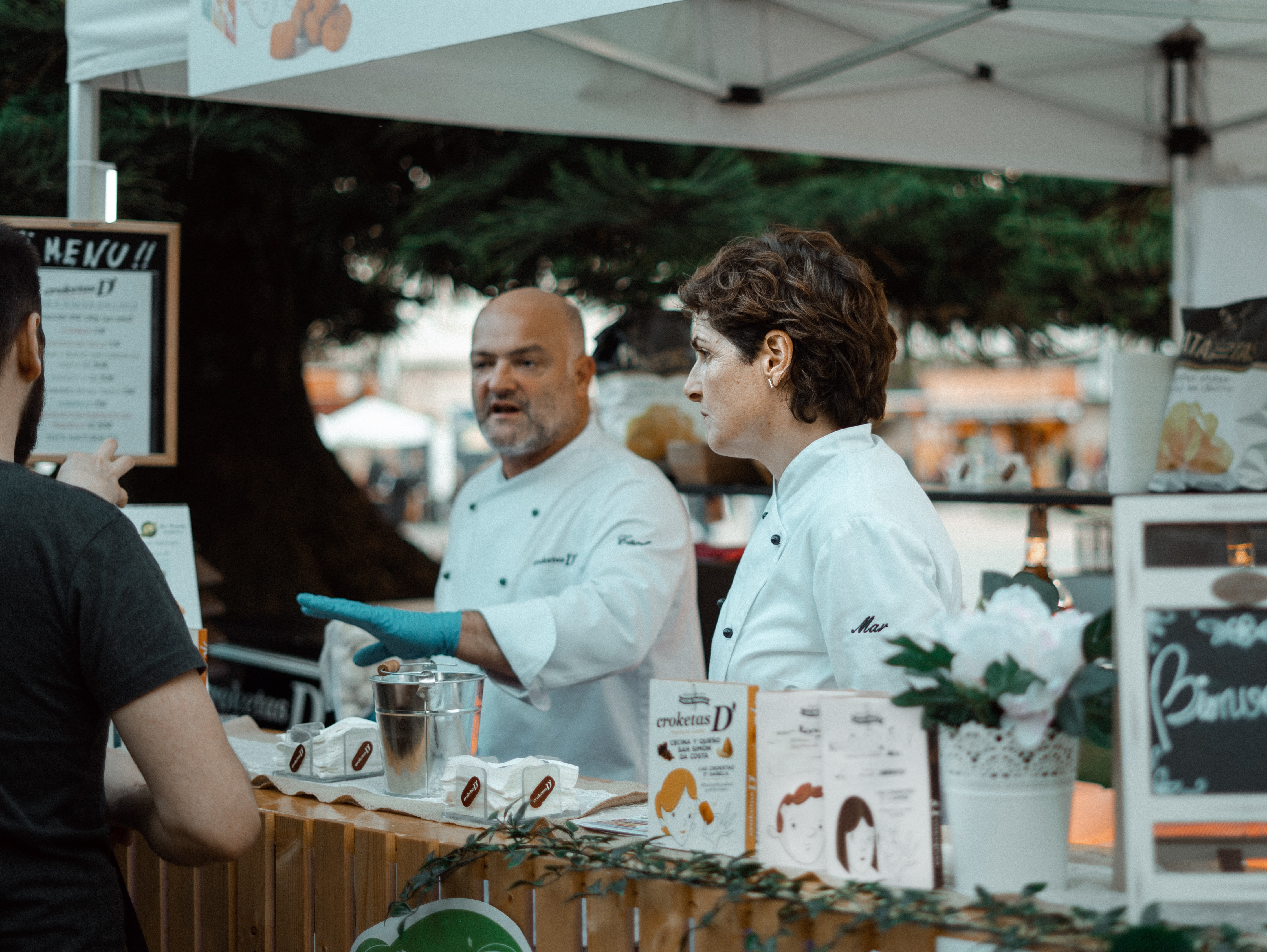 Couple works at food stand