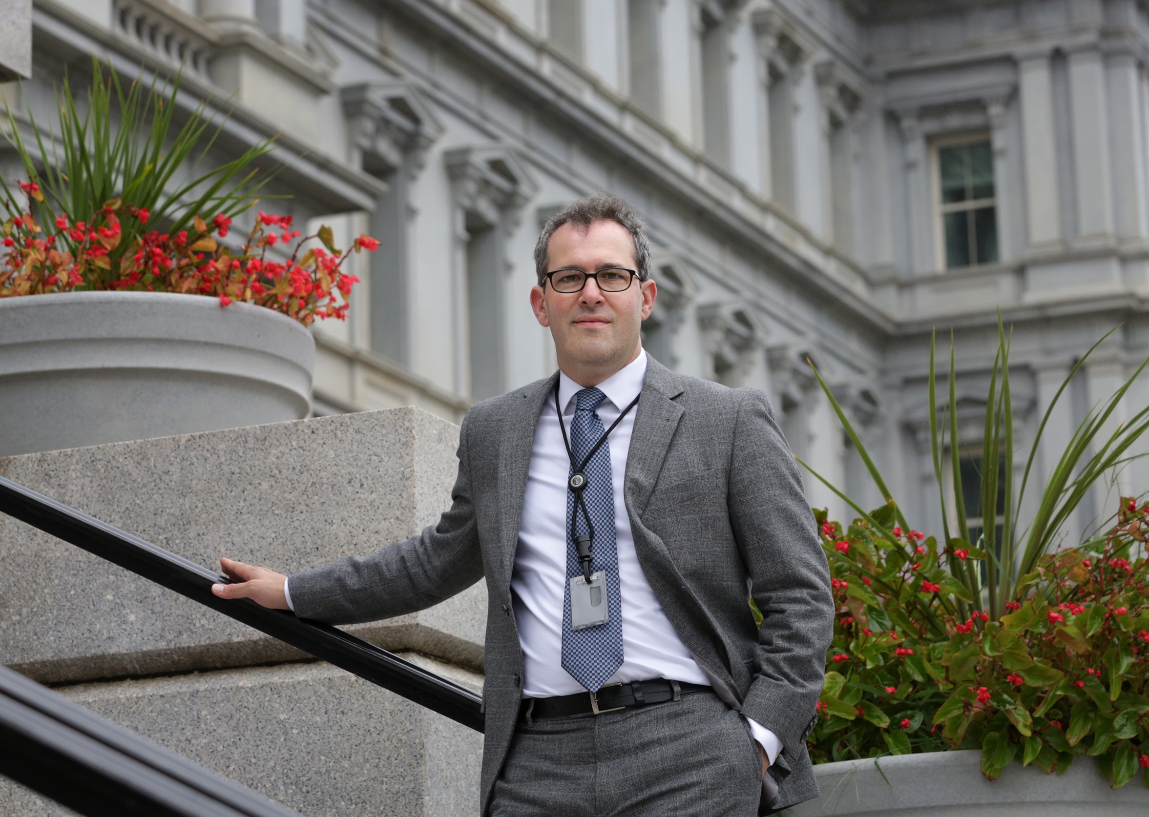 Aaron Sojourner in front of Minnesota building