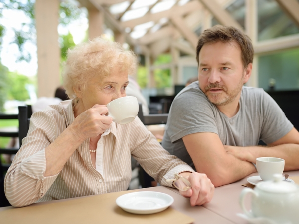 Elder mother with adult son