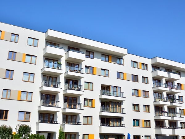 Apartment building with blue sky