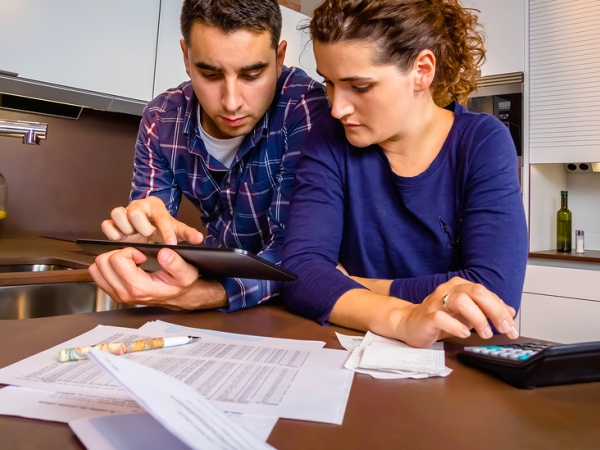 Couple looking over their montly bills