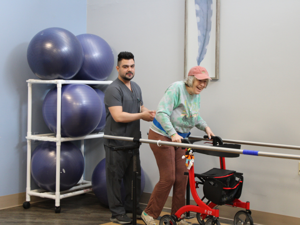 Ariel Martinez Ochoa helping patient