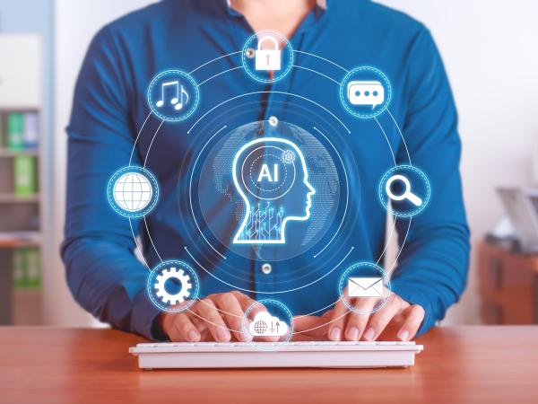 Man on comuputer using A.I. tools