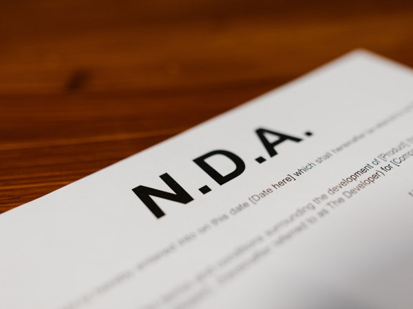 Image of an N.D.A document. Photo by RDNE Stock project: https://www.pexels.com/photo/close-up-o-a-contract-7841406/