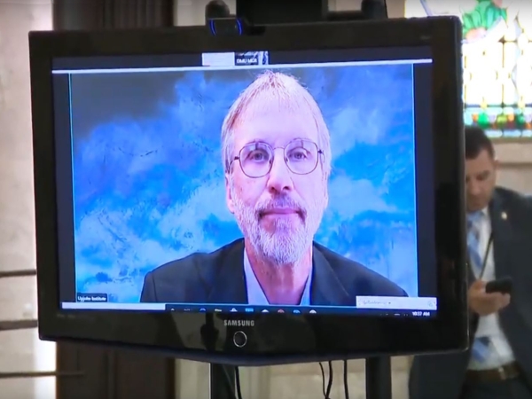Image of Tim Bartik on a television screen in New Jersey