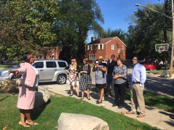 Kenyetta Campbell, executive director of Cody Rouge Community Action Alliance speaks to Upjohn Institute initiative policy advisory committee in Detroit's Stein Park