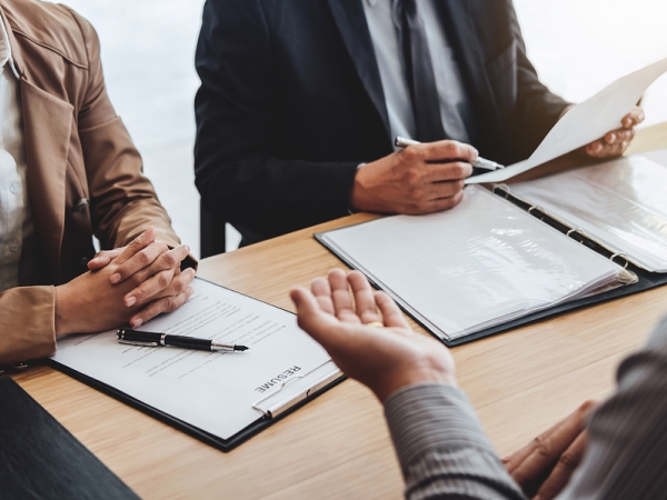 Hiring managers interview job candidate