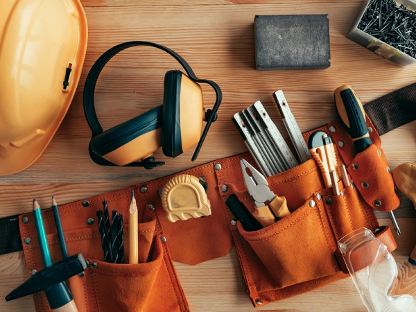 Handyman tool belt on workshop