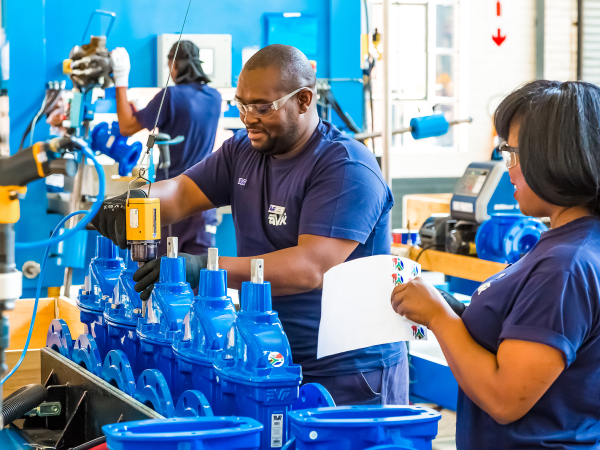 Works in manufacturing setting