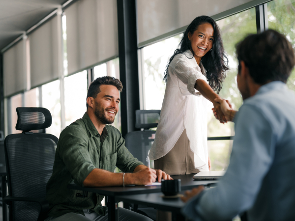 Business Team Shaking Hands During Office Meetingby nd3000