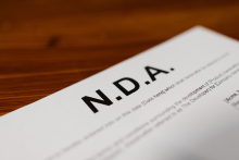 Image of an N.D.A document. Photo by RDNE Stock project: https://www.pexels.com/photo/close-up-o-a-contract-7841406/