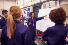 Female Instructor Teaching Students in Workshop Environmentby monkeybusiness